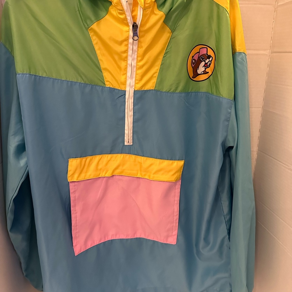 Green and Yellow Raincoat with Colorful Design and Half Zip Closure
